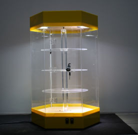 China Schöne drehbare Acrylausstellungsstand-Gestell-Gelb-Basis verschließbar mit geführtem Licht fournisseur